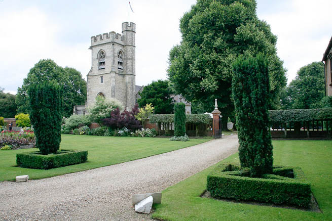 Gardens of a Tudor Manor house divided into compartments with different colour themes and structural forms.