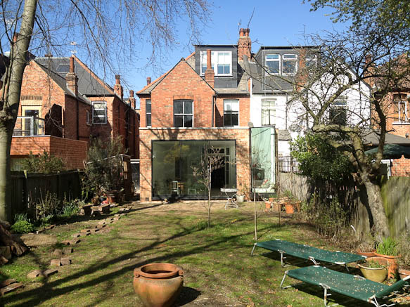 Large, modern kitchen in semi detached house.