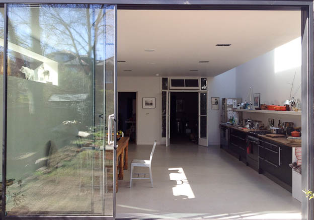 Large, modern kitchen in semi detached house.