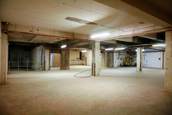 Fantastic basement warehouse events space with amazing variety of textures and full vehicle access.