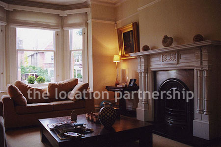 Living Room on Converted Victorian Family House With Through Living Room And A