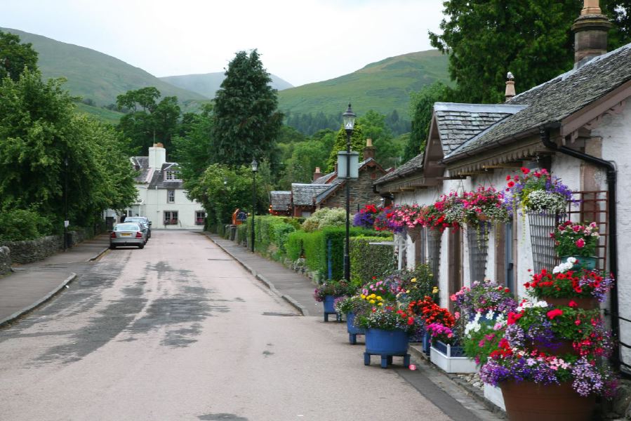 Small Scottish village with cottages running down to the shore of the