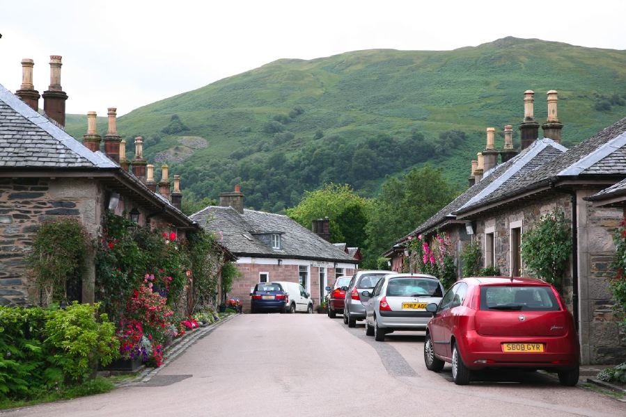 Small Scottish village with cottages running down to the shore of the